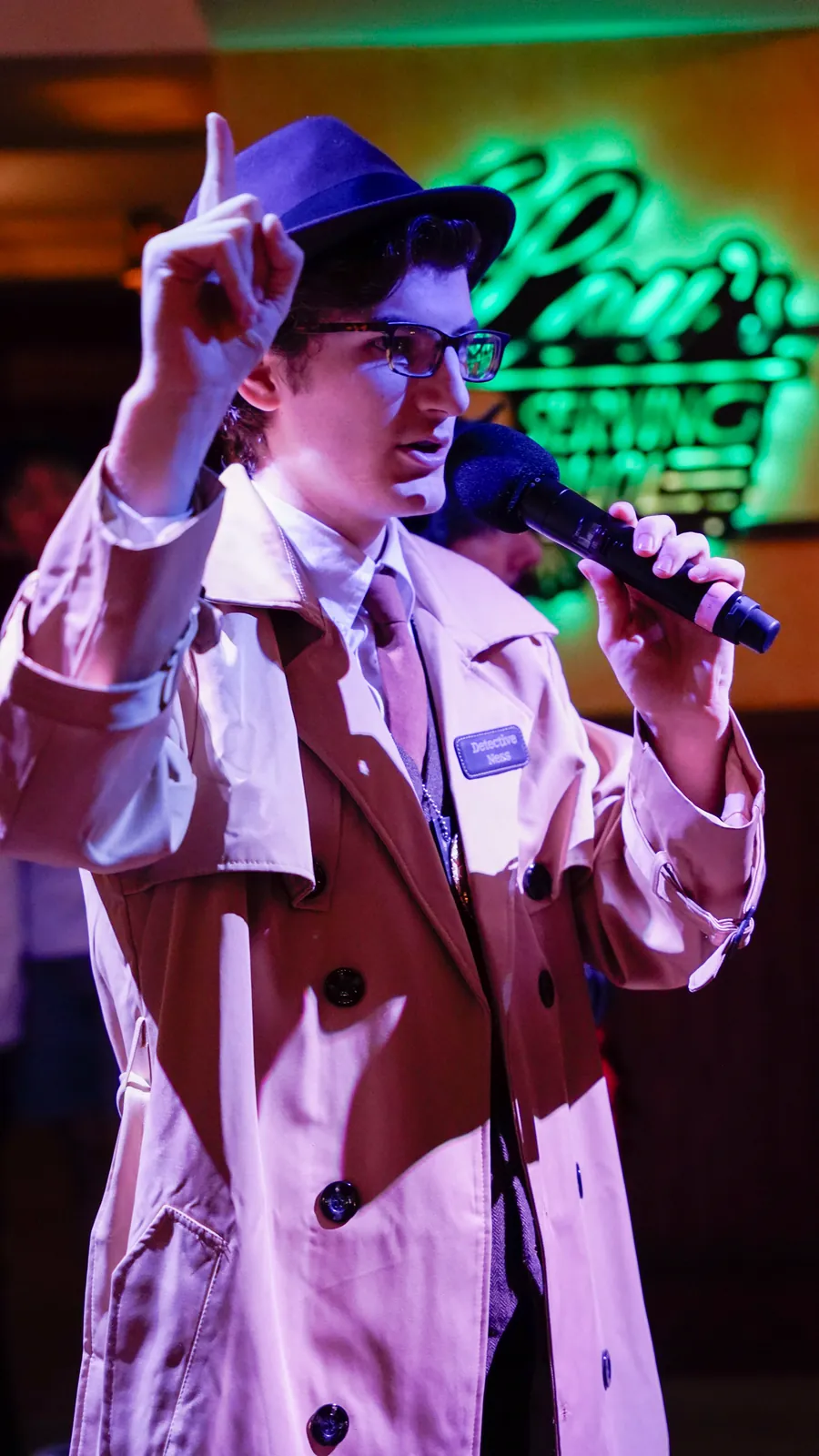 A Murder Mystery Company actor working the room at a Wichita show